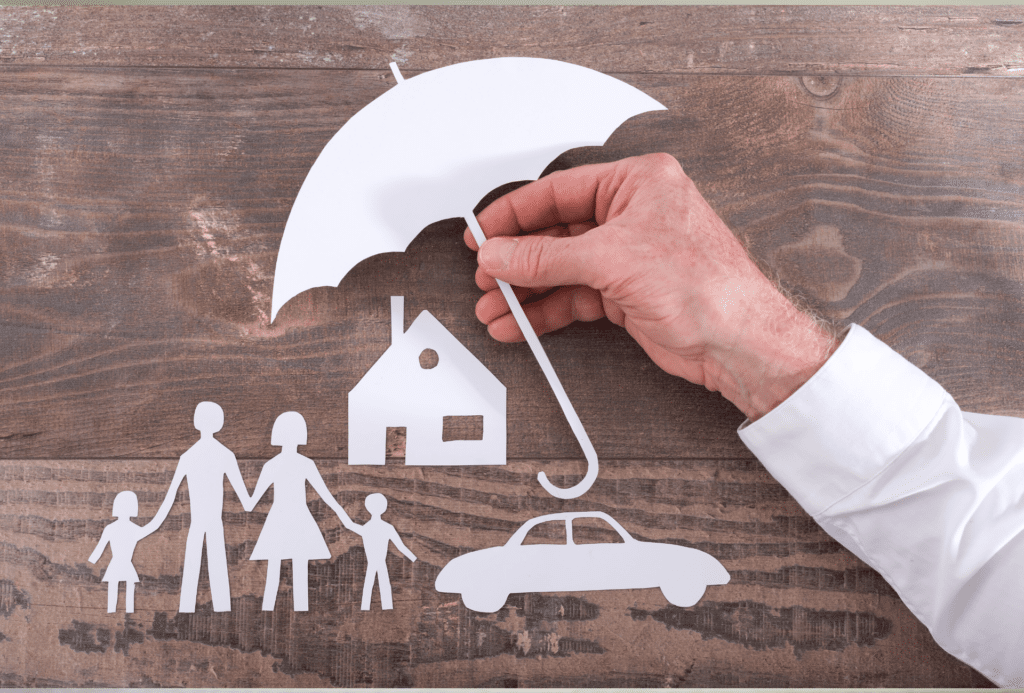 Insurer protecting a family, a house and a car with his hands holding umbrella ; multiple exposure