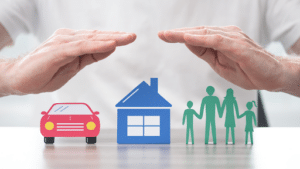 Insurer protecting a family, a house and a car with his hands holding ; multiple exposure